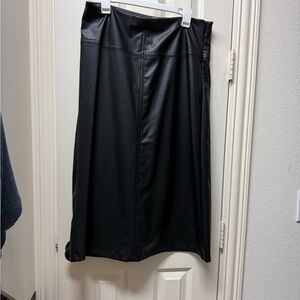 Black pleather skirt.  Side zip. Size 12